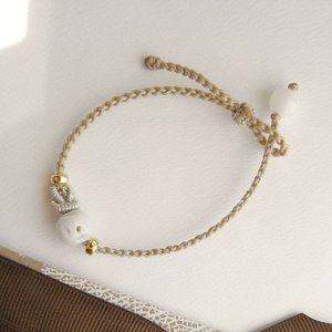 Traditional braided rope gold & Jade bracelet